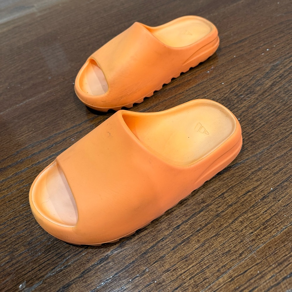 Yeezy orange slides.